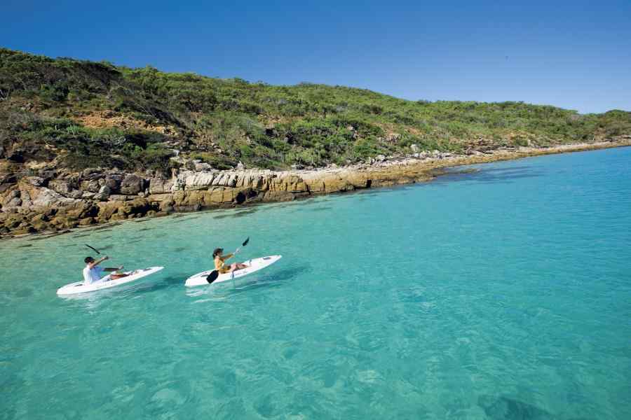 People on kayak in water 